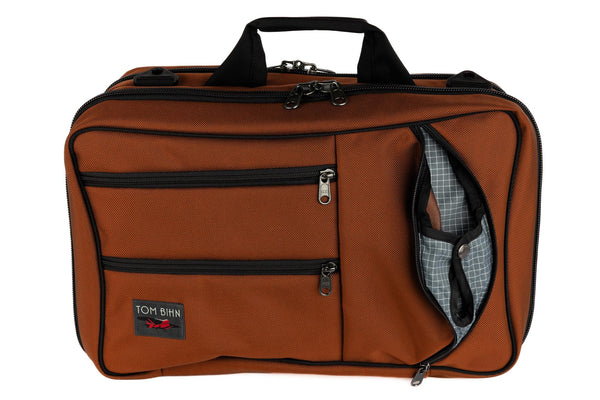 A Western Flyer in Burnt Orange 1050 Ballistic with Northwest Sky 200 Halcyon interior.